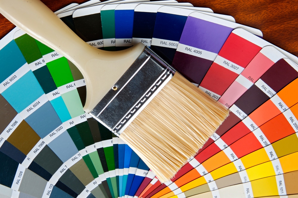 Color fans and brushes laid out together
