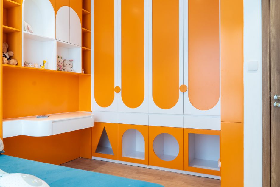 Built in shelving unit painted a bright orange